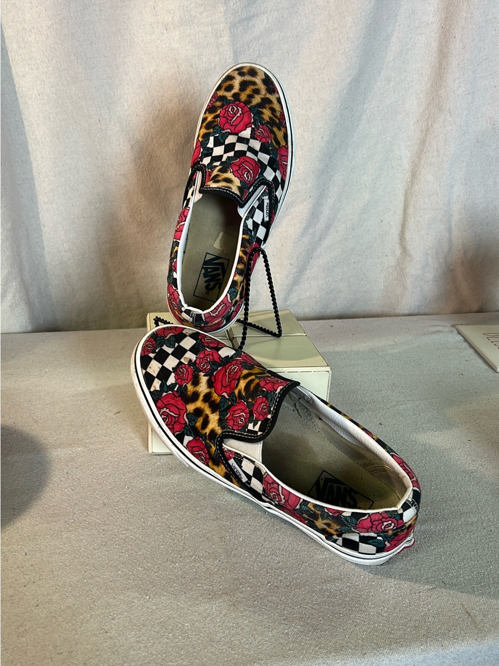 Vans Women's Slip-On Sneakers in Black, White, Red & Brown Leopard Print
